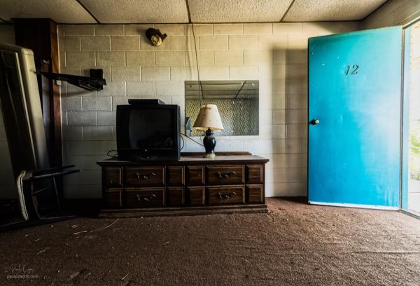 Point of view from the bed in an abandoned motel.